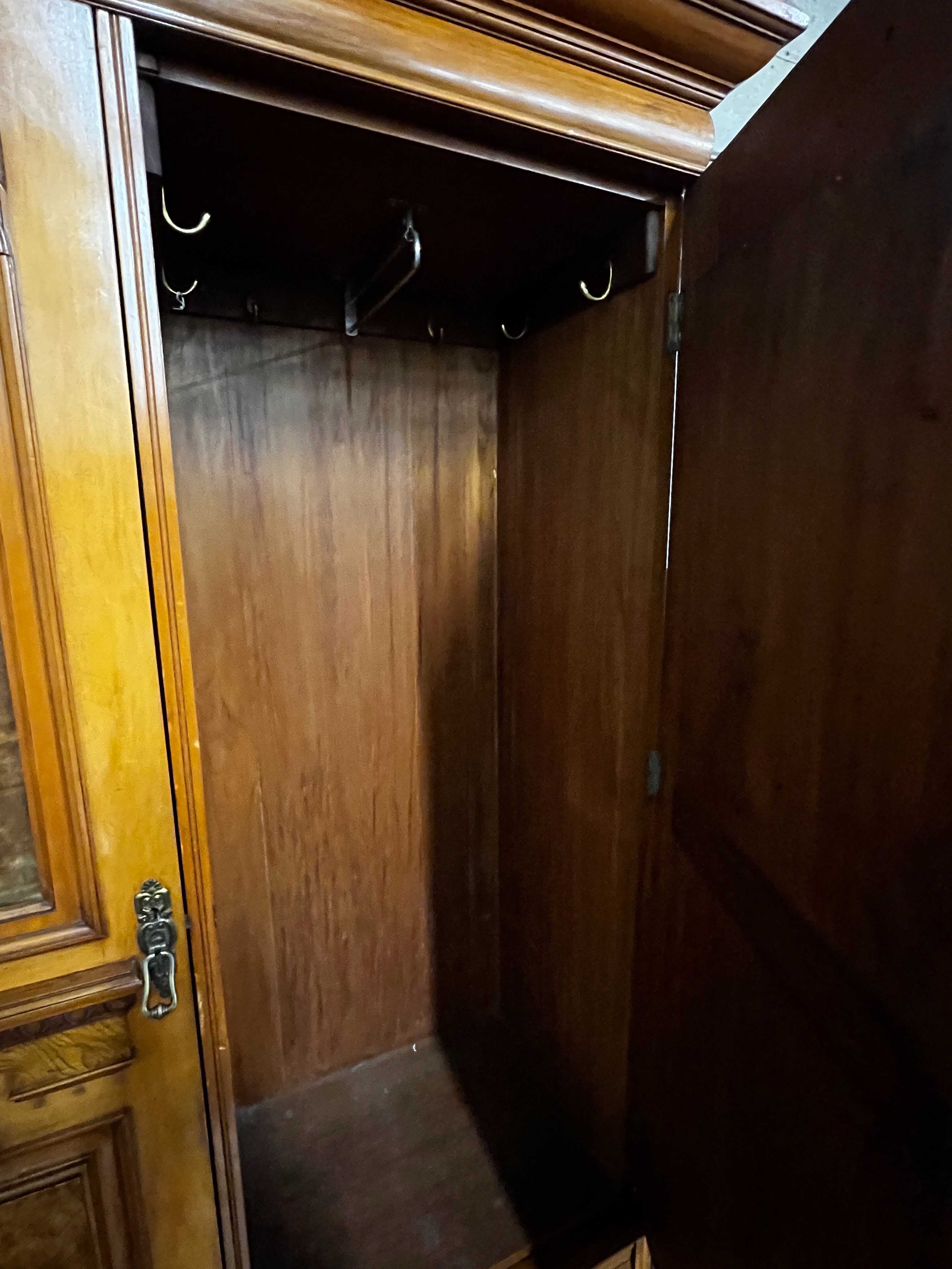 A late Victorian satin walnut and burr elm two door mirrored wardrobe, width 130cm, depth 50cm, height 210cm